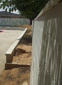 this wall is getting ready to fall over... you don't want to be responsible for that!